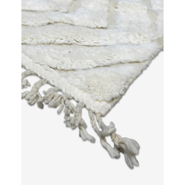 Contemporary Moroccan Rug | Handwoven Berber Wool Rug with Ivory Field and Tonal Chevron Texture This subtle contemporary...