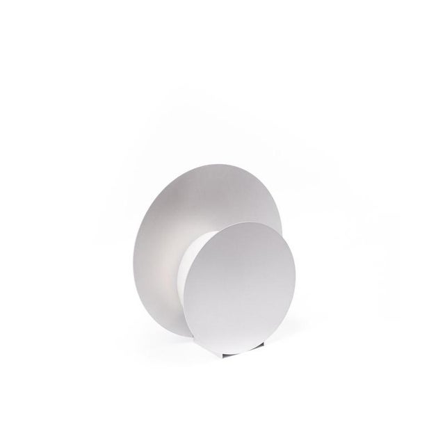 Phobos the eclipse table lamp in varnished aluminium by joana teixeira. Dimensions: d 8 x w 19 x h 26 cm. Materials:...