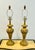 Beautiful and sophisticated pair of vintage Berman gold lamps with hints of gray and red veining and detailed scroll...