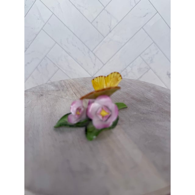 The sweetest little Herend yellow butterfly on flower & leaf figurine. Porcelain; Herend maker’s mark is stamped on bottom.