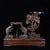 A beautifully crafted Chinese display stand, likely made of Huali (rosewood). The piece features a sturdy rectangular base...