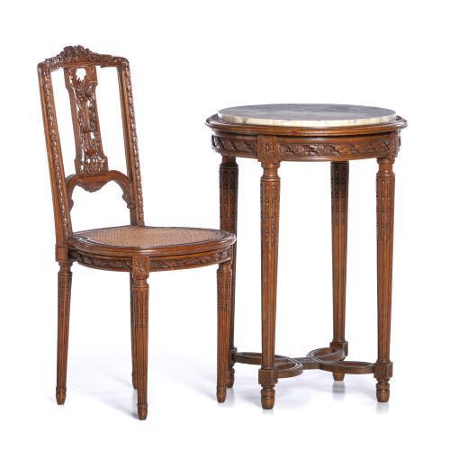 In profusely carved oak wood from the 19th century, table with marble top, chair with openwork back and straw seat. Small...