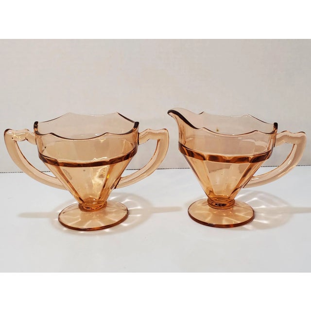 Pattern: Egg Harbor Color: Pink Manufacturer: Liberty Works Date Produced: 1929 Shape: Footed Creamer & Open Sugar