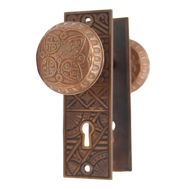 Antique Vernacular style bronze door knob set made by Norwalk in the 1885 catalog. It is part of the H-22100 group. The...