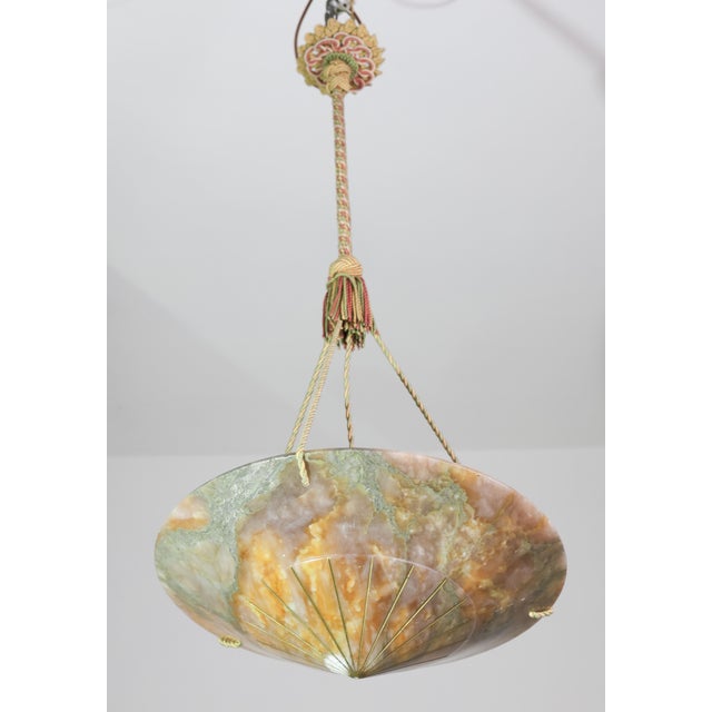 Antique Art Deco style alabaster pendant light, circa 1940s. A unique piece in alabaster, beautifully worked with shades...