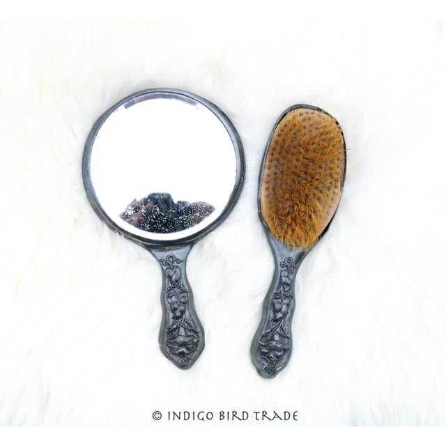 1900's Art Nouveau Silver Plated Hand Mirror and Brush Set These magnificent hand mirror and brush are made from silver...