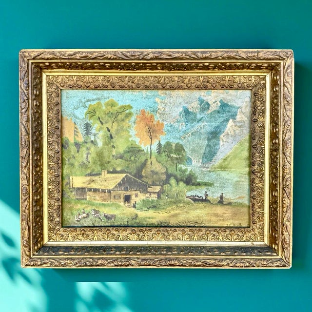 This antique 1893 oil painting by S. E. Groff captures a serene mountain landscape featuring a rustic cabin beside a calm...