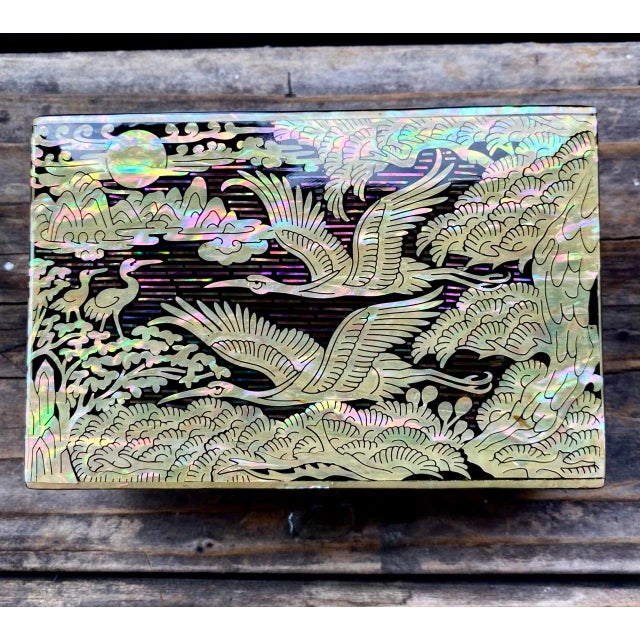 This exceptionally fine Korean mother-of-pearl lacquer box is almost jewel-like in its construction and finish. Measuring...