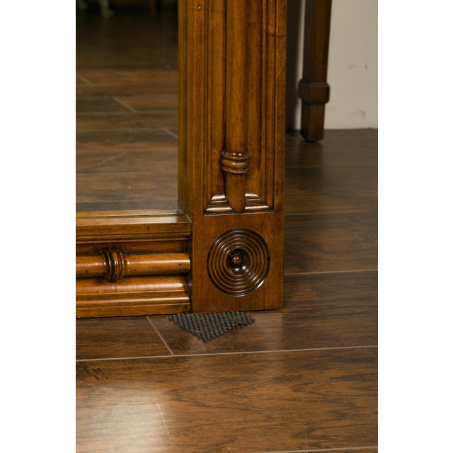 A large English faux-bamboo walnut mirror made from old doors from the early 20th century, with carved ivy motifs....