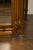 A large English faux-bamboo walnut mirror made from old doors from the early 20th century, with carved ivy motifs....