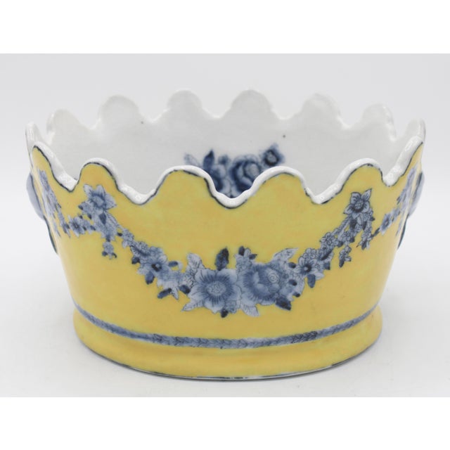 A lovely mid 20th century ceramic cachepot planter in striking shades of yellow and blue. This is a beautiful planter with...