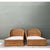 This pair of vintage Mid-Century Modern chaise lounges showcases the natural beauty of braided rattan in a relaxed, low-...