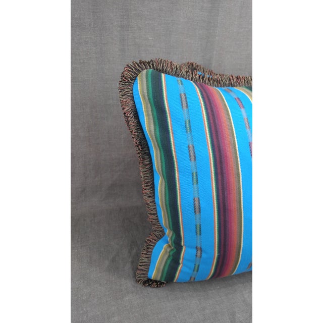 A Pair of colorful Textile woven stripe throw pillows with Décor De Paris multi color fringe, these pillows have a great...