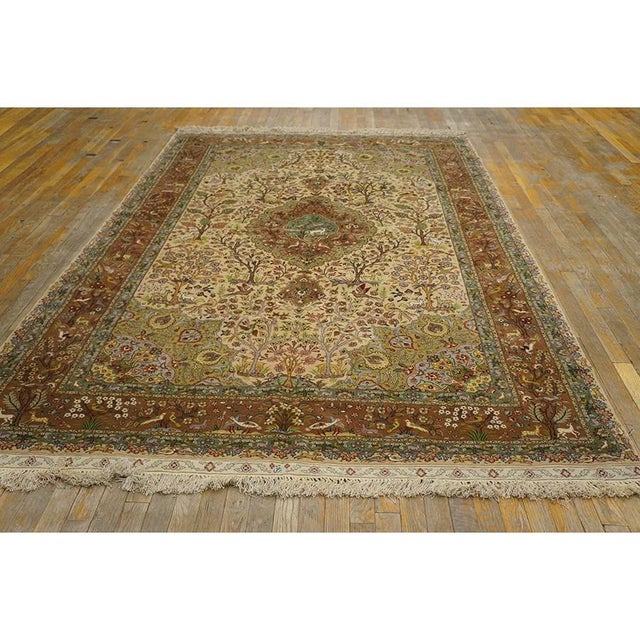 This exceptional 1940 Antique Tabriz Silk Persian Formal rug is a highly refined masterpiece originating from the...