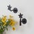 Unique wrought iron wall hook from Spain, 1950s. Black iron flower with stem and round iron backplate. Original iron...