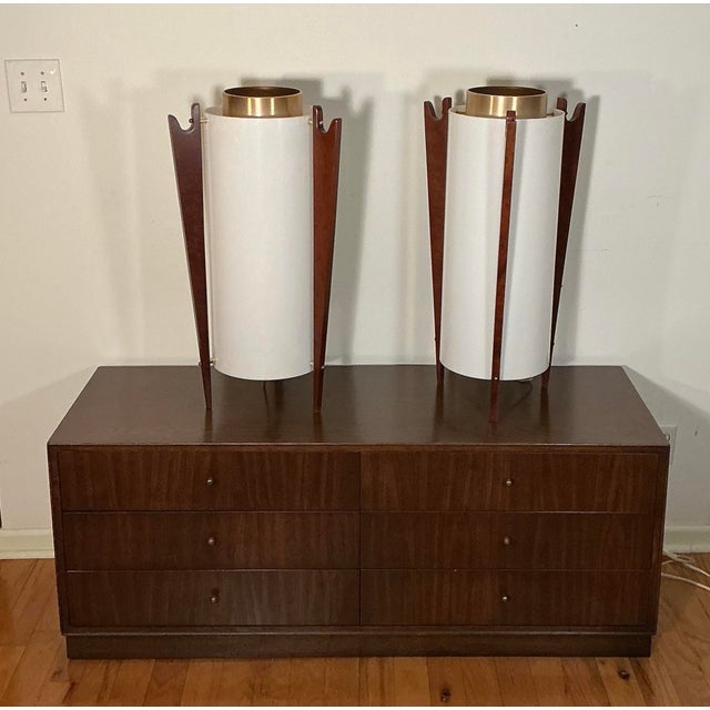 A pair of vintage hanging church lights converted into table lamps from the 1970s. These pair of lights feature a white...