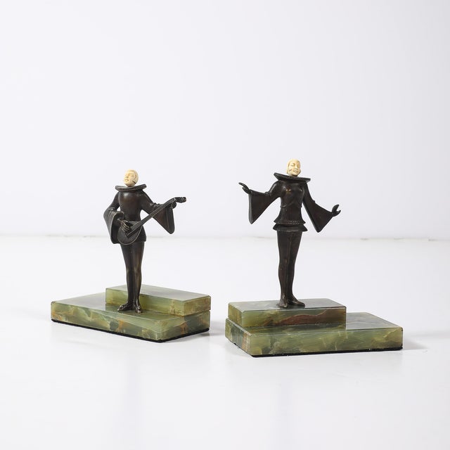 This pair of Art Deco flapper bookends, crafted in France circa 1930, celebrates the glamour and sophistication of the Art...