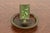 A beautiful Arts & Crafts or Art Nouveau period "Grapevine" pattern bronze and slag glass ashtray with matchbox holder...