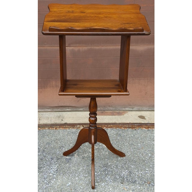 This is a walnut lectern or music stand, Dictionary stand designed in a mid-century or vintage style, featuring a...