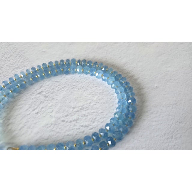 Introducing this utterly charming, light, airy, and sparkling necklace, crafted from faceted aquamarine beads. The high-...
