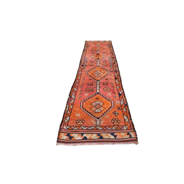 Handknotted vintage decorative Herki runner from Northern Iraq. Approximately 50-60 years old. In very good condition.