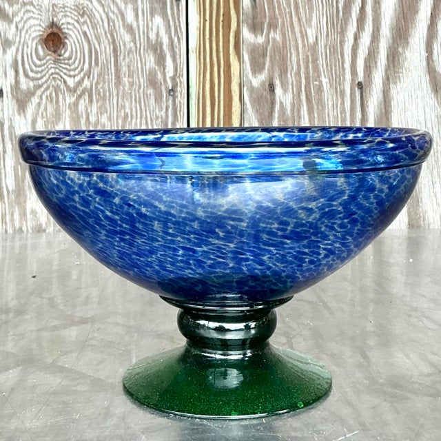 Enhance your space with this unique Vintage Boho Blown Glass Bowl, a true work of art that combines functionality with...