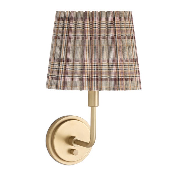 The Polly Wall Sconce brings an air of refined elegance with its single scalloped shade, casting a warm and comforting...