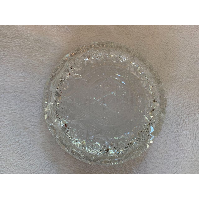 Beautiful American brilliant cut glass bowls. Shimmers in the light. A beautiful addition to any room.