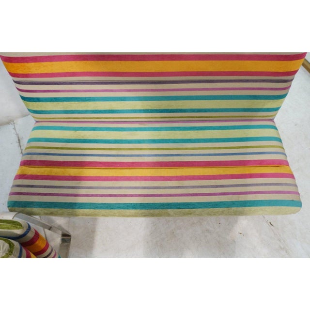 A pair of awning striped chenille chrome modernist sofas with stunning chrome legs by Kho Liang Ie for Artifort, circa...