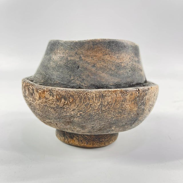 Wood lid to a milk jug. Unknown origin. Hand-carved lid to a wooden milk container. Traditionally used to store and carry...