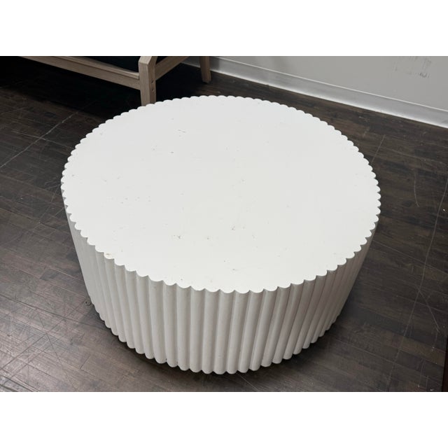 Design Plus Gallery presents the Tropea Fluted White Indoor/Outdoor Coffee Table from Williams Sonoma Home. The table has...