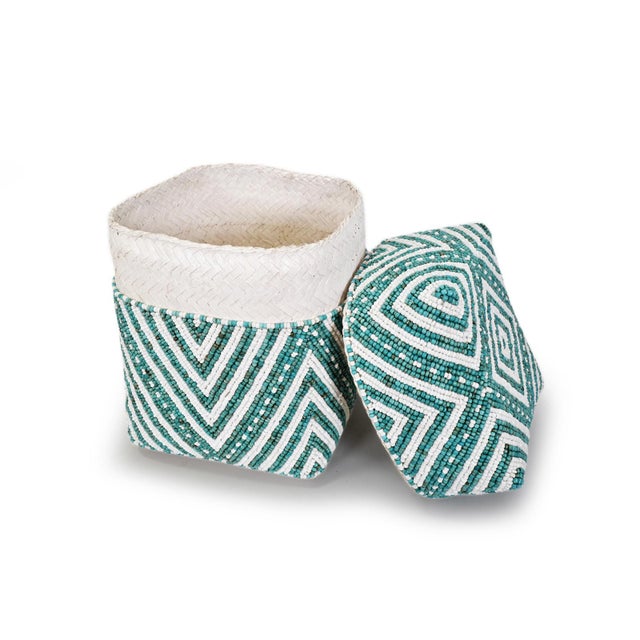 Beautiful hand beaded accessory box made from woven bamboo and intricately covered with geometric triangle patterns. Very...
