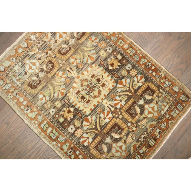an early 20th Century Persian Sarouk Mini size rug