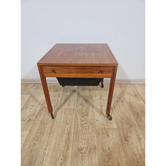 Original danish coffee table/threader in mid-century modern style from the 1950s and 1960s. This compact and functional...