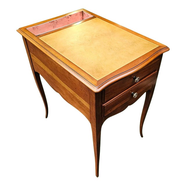 This Vintage Louis XV Revival Style Rafraîchissoir is a wonderful example of timeless furniture elegance in a classic...