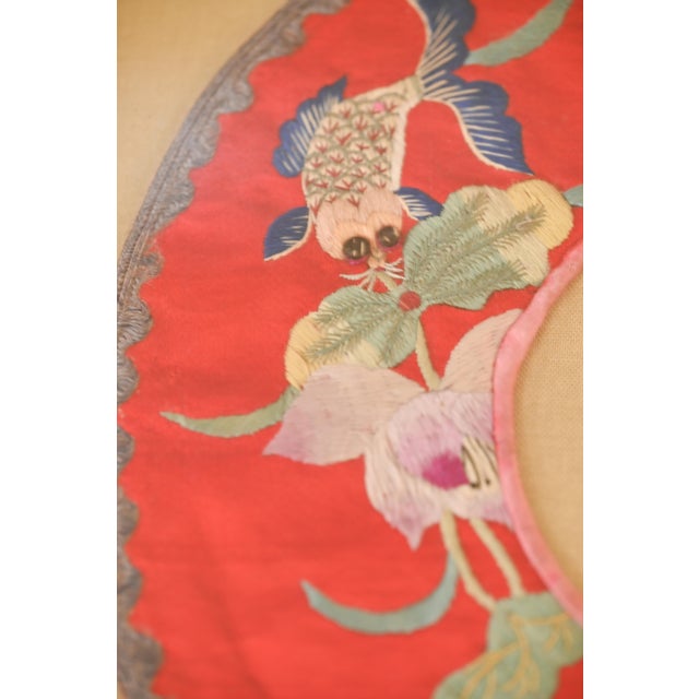 This Chinese children's collar was typically worn at festivals. The collar is embroidered silk featuring a koi and lotus...