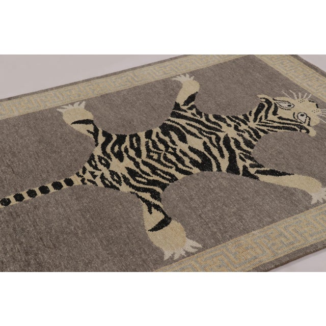 Hand-knotted in wool, this 5x7 rug is a striking new addition to our Distressed Homage collection, inspired by a mid-...