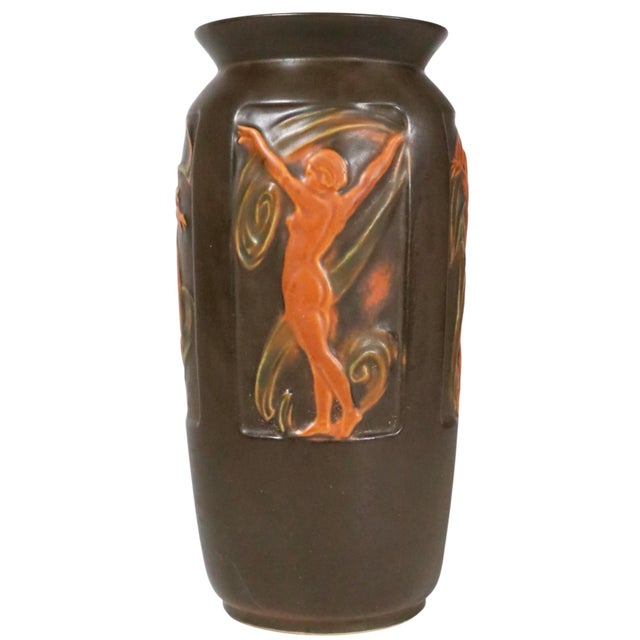 American Art Deco art pottery vase by Roseville from the Rosecraft Panel series, circa 1920-26. The vase features a brown...