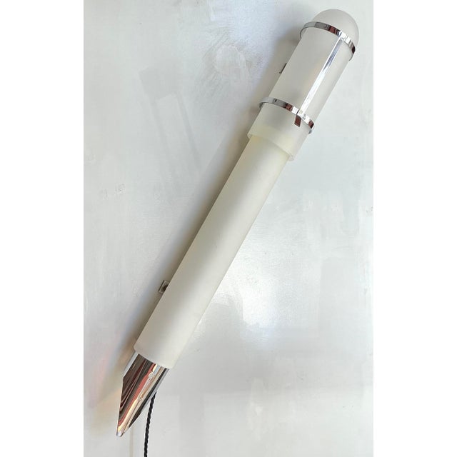 Very rare! Large wall lamp made of chrome-plated metal and frosted glass cylinders, probably used for advertising in...
