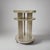An Art Deco two-tiered side table in white gold leaf. The silvery reflection has a decidedly enchanting effect in an...
