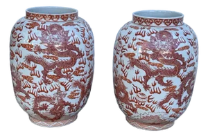 Pair of Red and White Chinese Porcelain Vases With Dragons