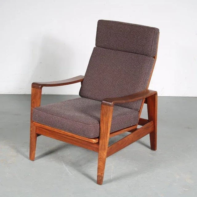 A highback lounge chair designed by arne wahl iversen, manufactured by komfort in denmark around 1960. newly upholstered...
