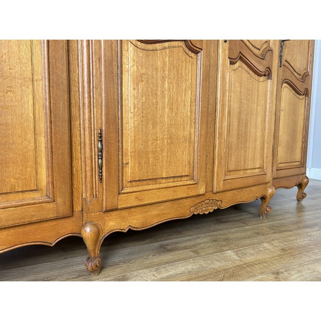 Vintage Louis XVI French Oak Four Door Carved Armoire For Sale - Image 9 of 11