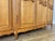 Vintage Louis XVI French Oak Four Door Carved Armoire For Sale - Image 9 of 11