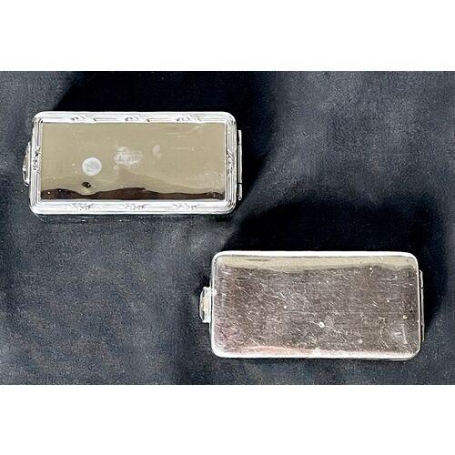 Pair of vintage chrome lidded pill boxes with glass liners. Non-decorated box has a milk glass liner and decorated box...