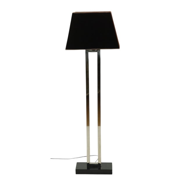 Luxurious Eichholtz Arlington designer floor lamp made of stainless steel, featuring a rectangular granite base and a dark...
