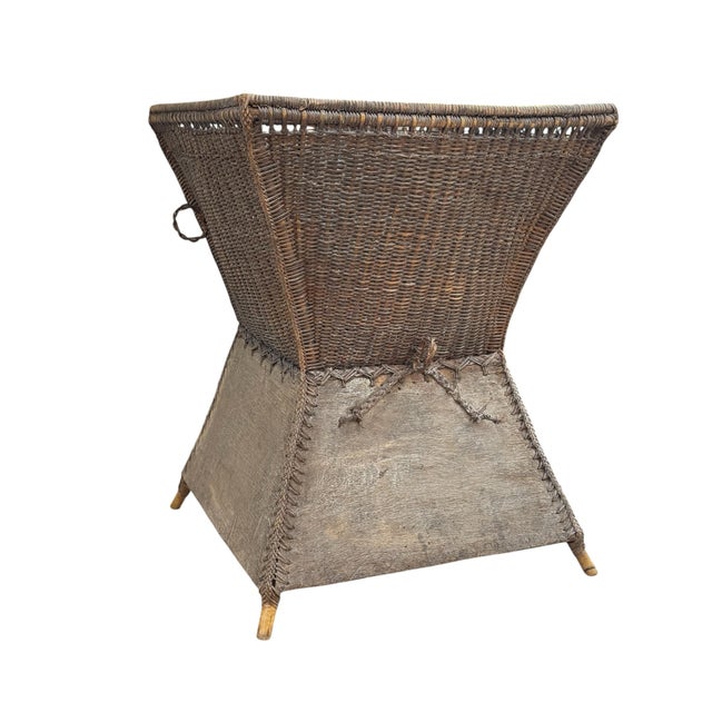This is a vintage Ifugao woven rattan and bamboo potato carrying basket from the Philippines. This was part of a...