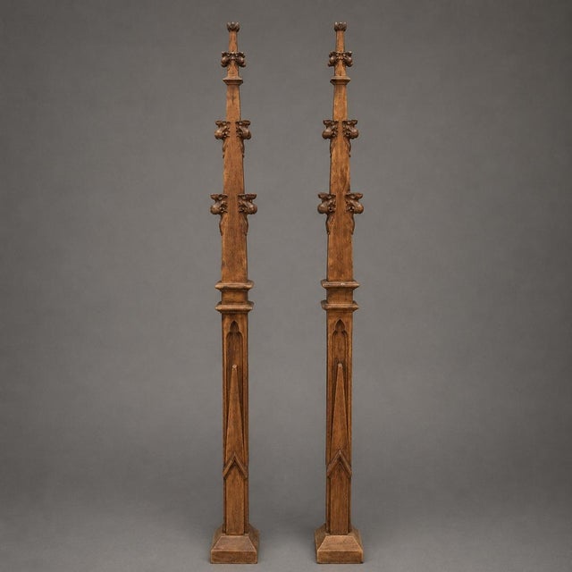 This pair of 19th Century French carved oak church spires showcases striking Gothic-inspired craftsmanship and...