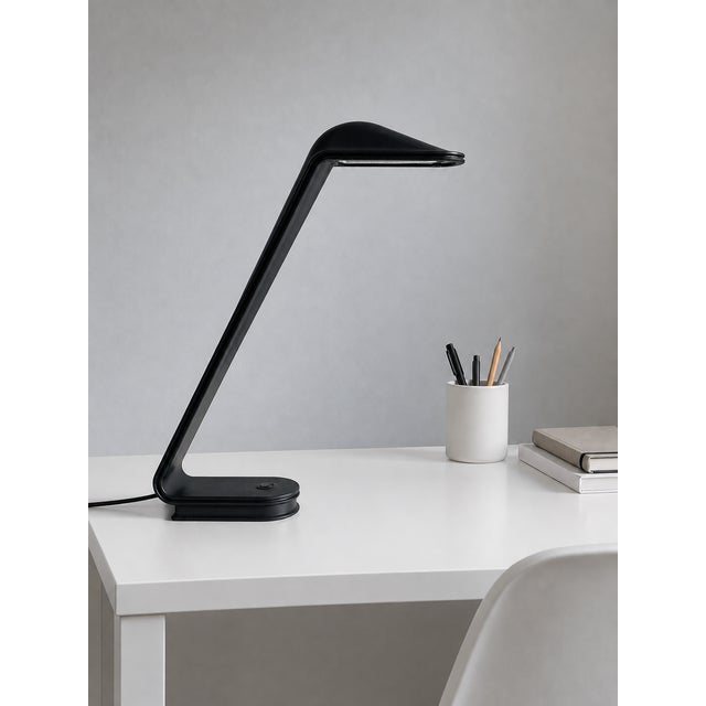 When switched on, this lamp instantly conjures a corner office circa 1985 — sleek, confident, and just a little...