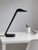 When switched on, this lamp instantly conjures a corner office circa 1985 — sleek, confident, and just a little...